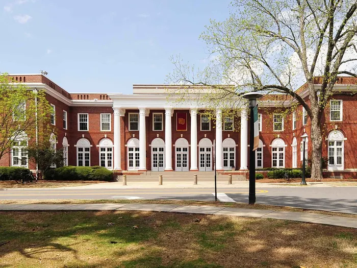 Red brick building with white columns in the Winthrop College Historic District